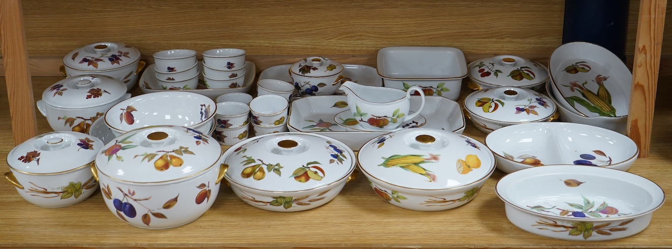 A collection of Royal Worcester Evesham dinnerware to include tureens, dishes and a sauce boat, largest 32cm wide. Condition - fair